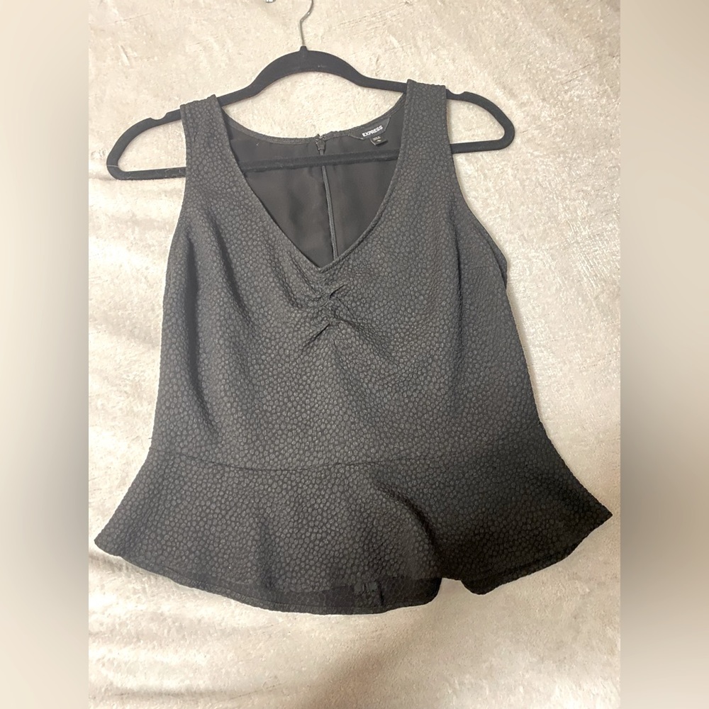 Express peplum top. Black pattern. Size medium